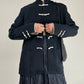 Giacca nera stile orientale con alamari bianchi