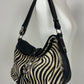 Borsa in vera pelle con pannello in cavallino zebrato