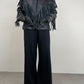 Chiodo vintage in pelle con frange e rose
