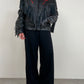 Chiodo vintage in pelle con frange e rose