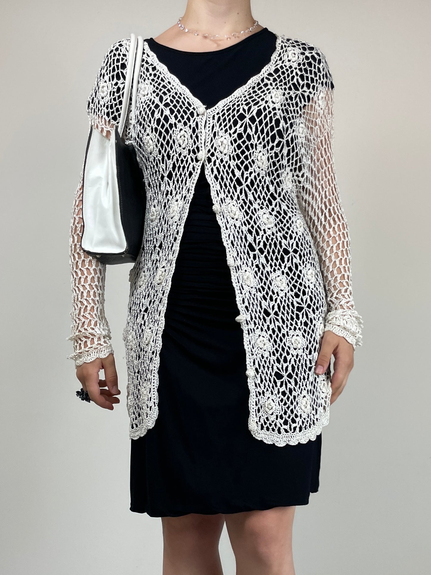 Cardigan all’uncinetto con motivo floreale