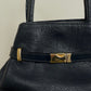 Blue leather handbag