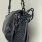 Borsa baguette in pelle nera con manico intrecciato