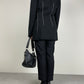 Blazer in lana vergine nero con ricami bianchi