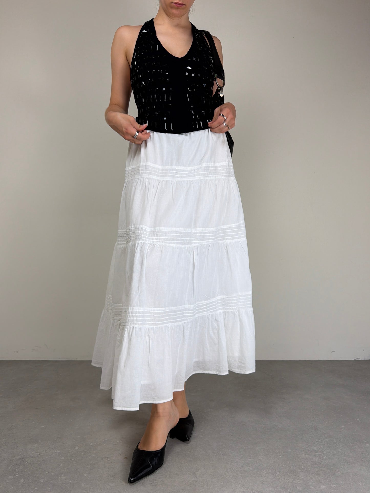 Top nero con pietre nere sfaccettate