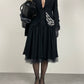 Blazer nero con ricamo intagliato