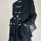 Giacca nera stile orientale con alamari bianchi