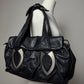 Borsa da spalla in pelle con dettagli in metallo
