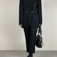 Blazer in lana vergine nero con ricami bianchi