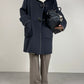 Cappotto grigio con alamari in lana, angora e cammello