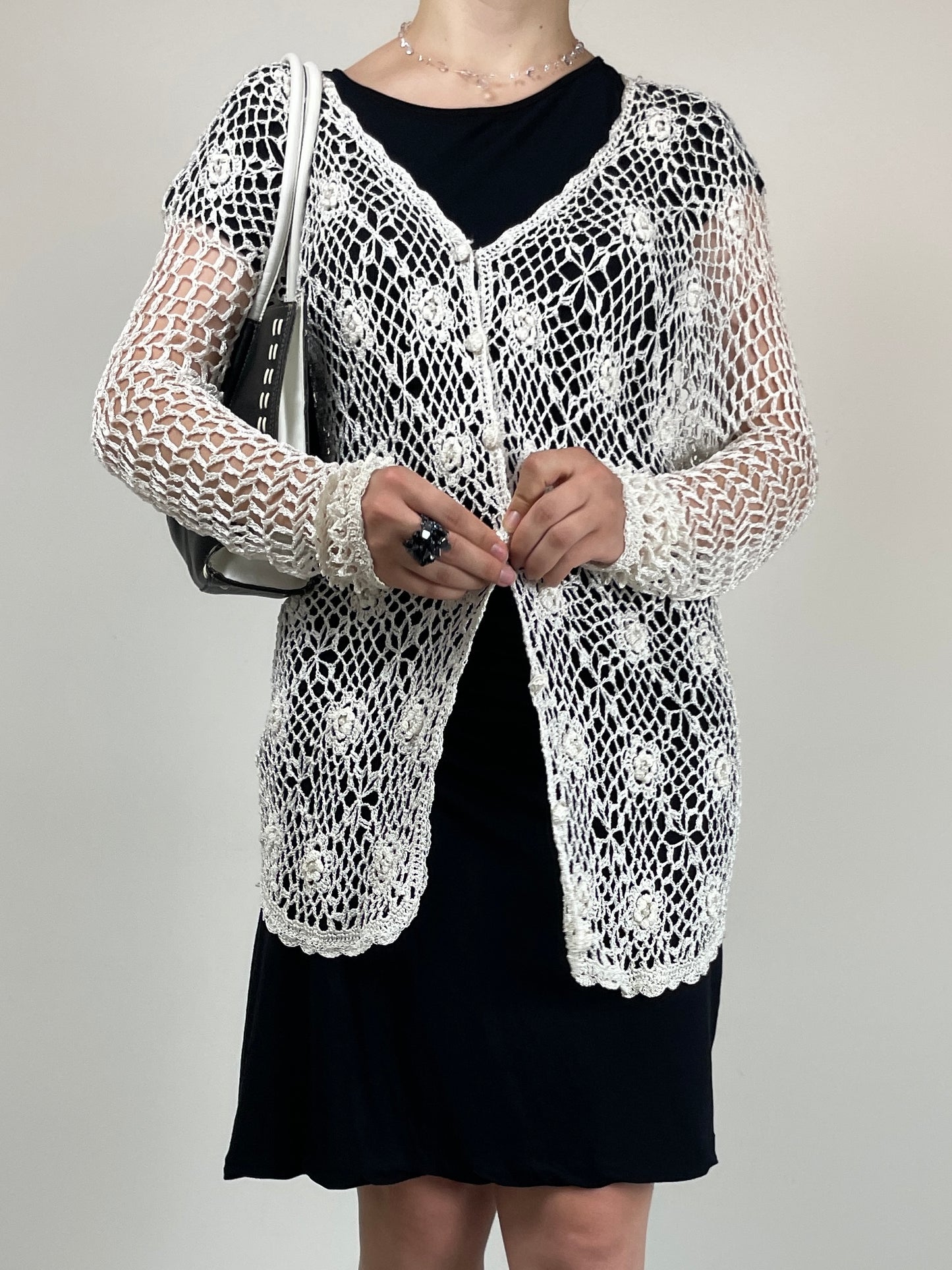Cardigan all’uncinetto con motivo floreale