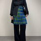 Gonna a pieghe in fantasia tartan con alamari
