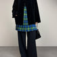 Gonna a pieghe in fantasia tartan con alamari