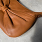 Bow leather bag