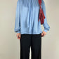 Light blue silk blouse