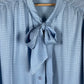 Light blue silk blouse