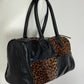 Bauletto in pelle verniciata e cavallino leopardato