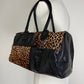 Bauletto in pelle verniciata e cavallino leopardato