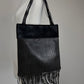 Borsa in vera pelle intrecciata con inserto in cavallino