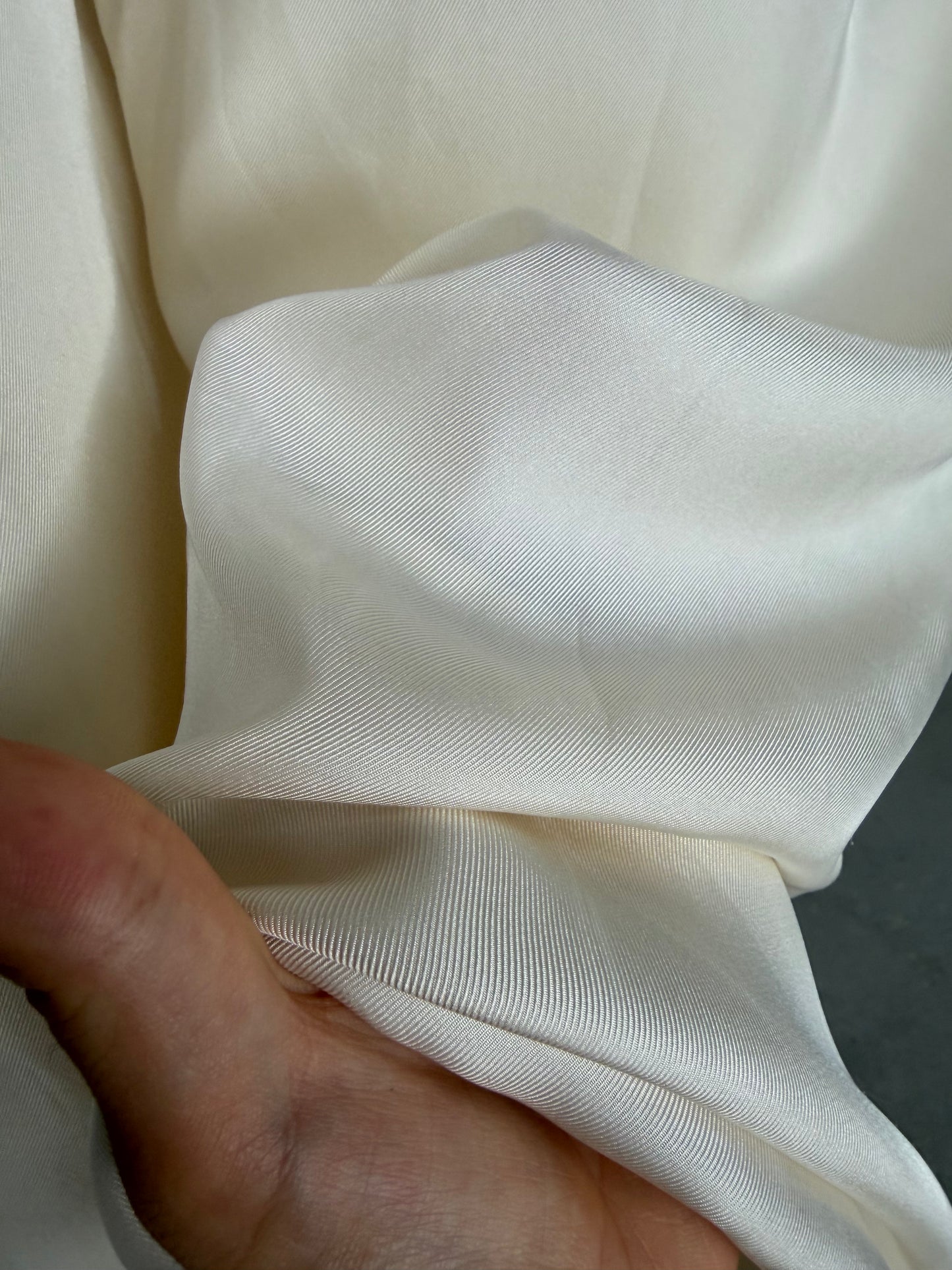 Pantaloni a palazzo in pura seta color latte