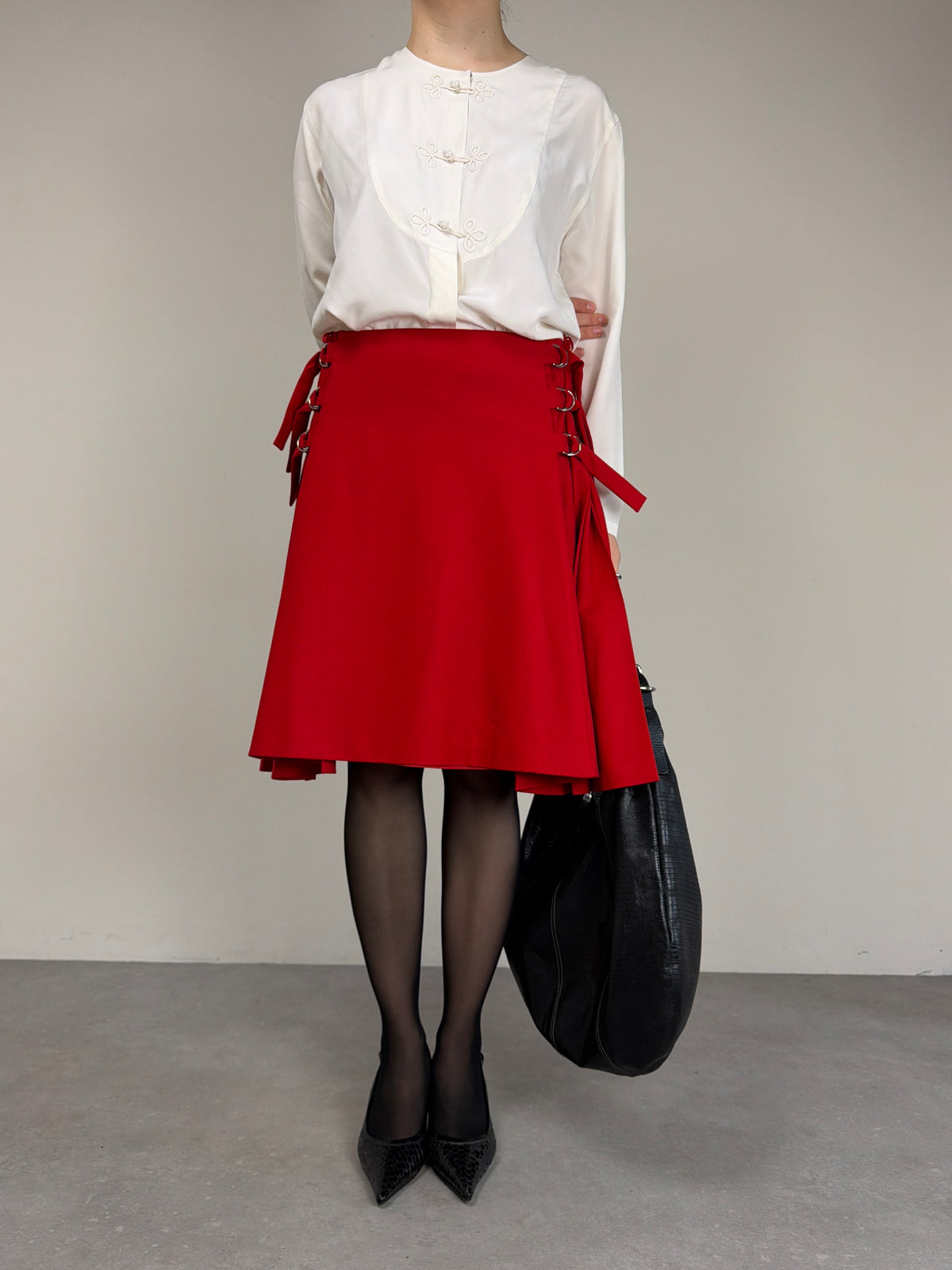 JIL SANDER gonna in lana con pieghe laterali