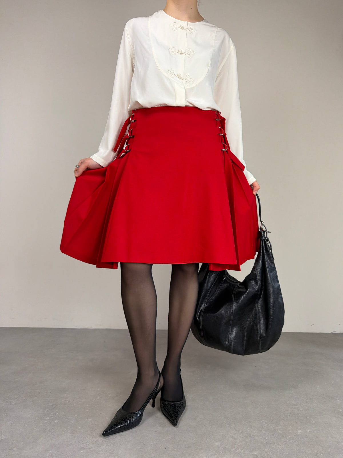 JIL SANDER gonna in lana con pieghe laterali