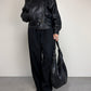 Bomber vintage in vera pelle nera con cintura in vita