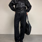 Bomber vintage in vera pelle nera con cintura in vita