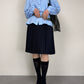 Camicia azzurra in cotone con pieghe