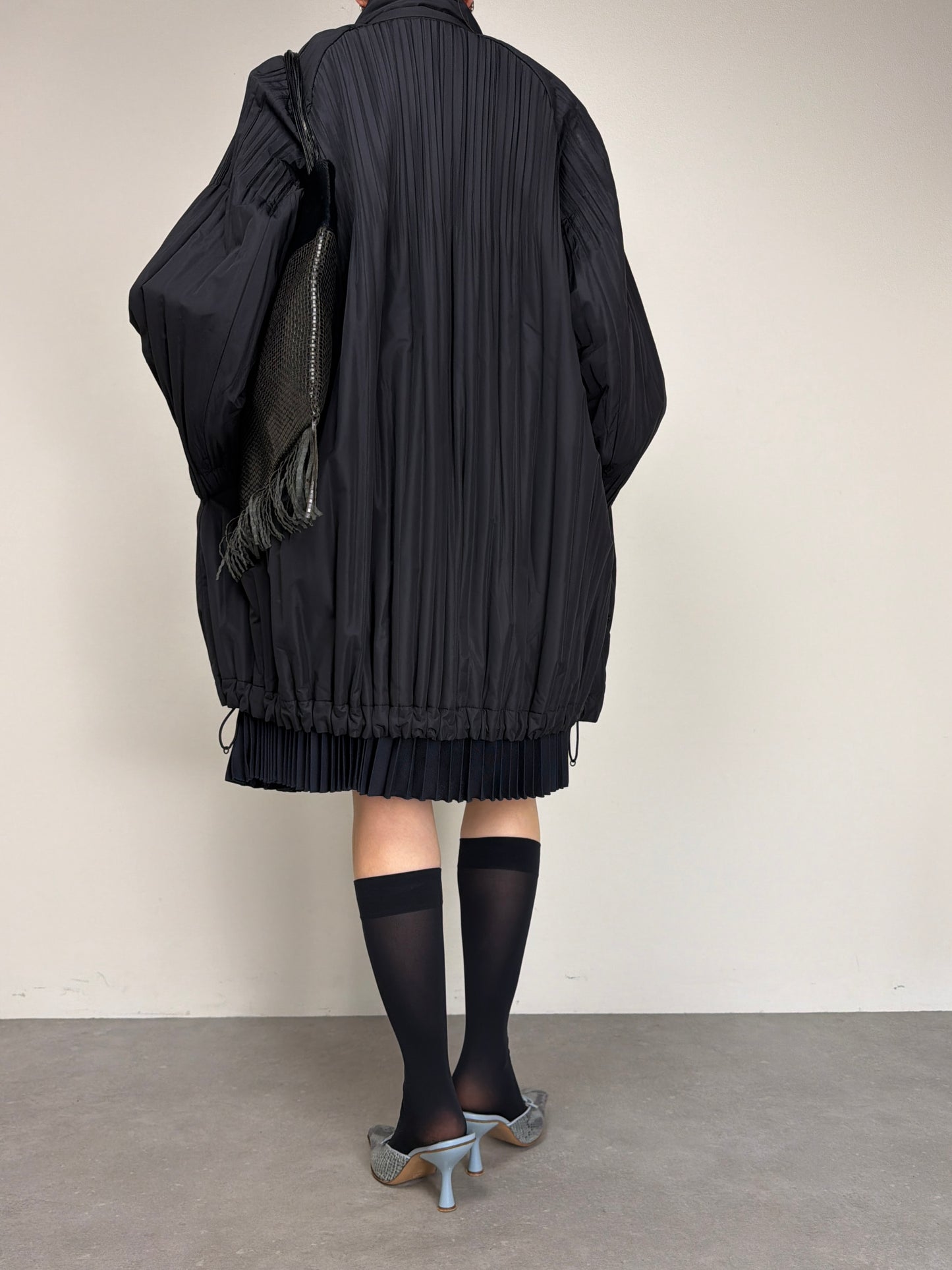 Pleats Please Issey Miyake Piumino prissettato