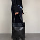 Borsa in vera pelle intrecciata con inserto in cavallino