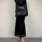 Borsa in vera pelle intrecciata con inserto in cavallino