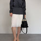 Blusa in pura seta grigia con drappeggio