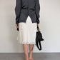 Blusa in pura seta grigia con drappeggio