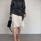 Blusa in pura seta grigia con drappeggio