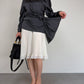 Blusa in pura seta grigia con drappeggio