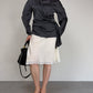 Blusa in pura seta grigia con drappeggio
