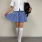 Gonna in cotone a righe con punto smock