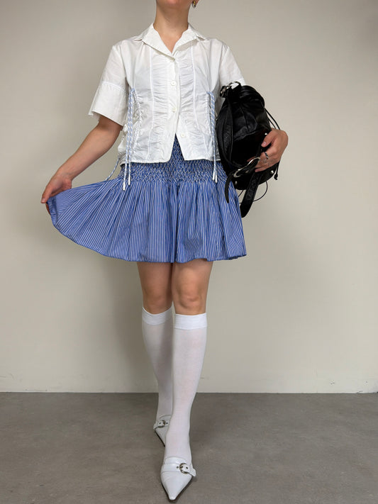 Gonna in cotone a righe con punto smock