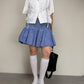 Gonna in cotone a righe con punto smock
