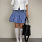 Gonna in cotone a righe con punto smock