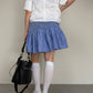 Gonna in cotone a righe con punto smock