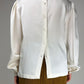 Blusa in seta ricamata a mano
