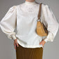 Blusa in seta ricamata a mano