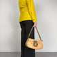 Borsa in vera pelle con dettagli in metallo