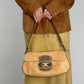Borsa in vera pelle con dettagli in metallo