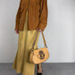 Borsa in vera pelle con dettagli in metallo