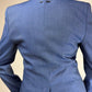 Blazer strutturato in pura lana con dettaglio del piercing sul retro