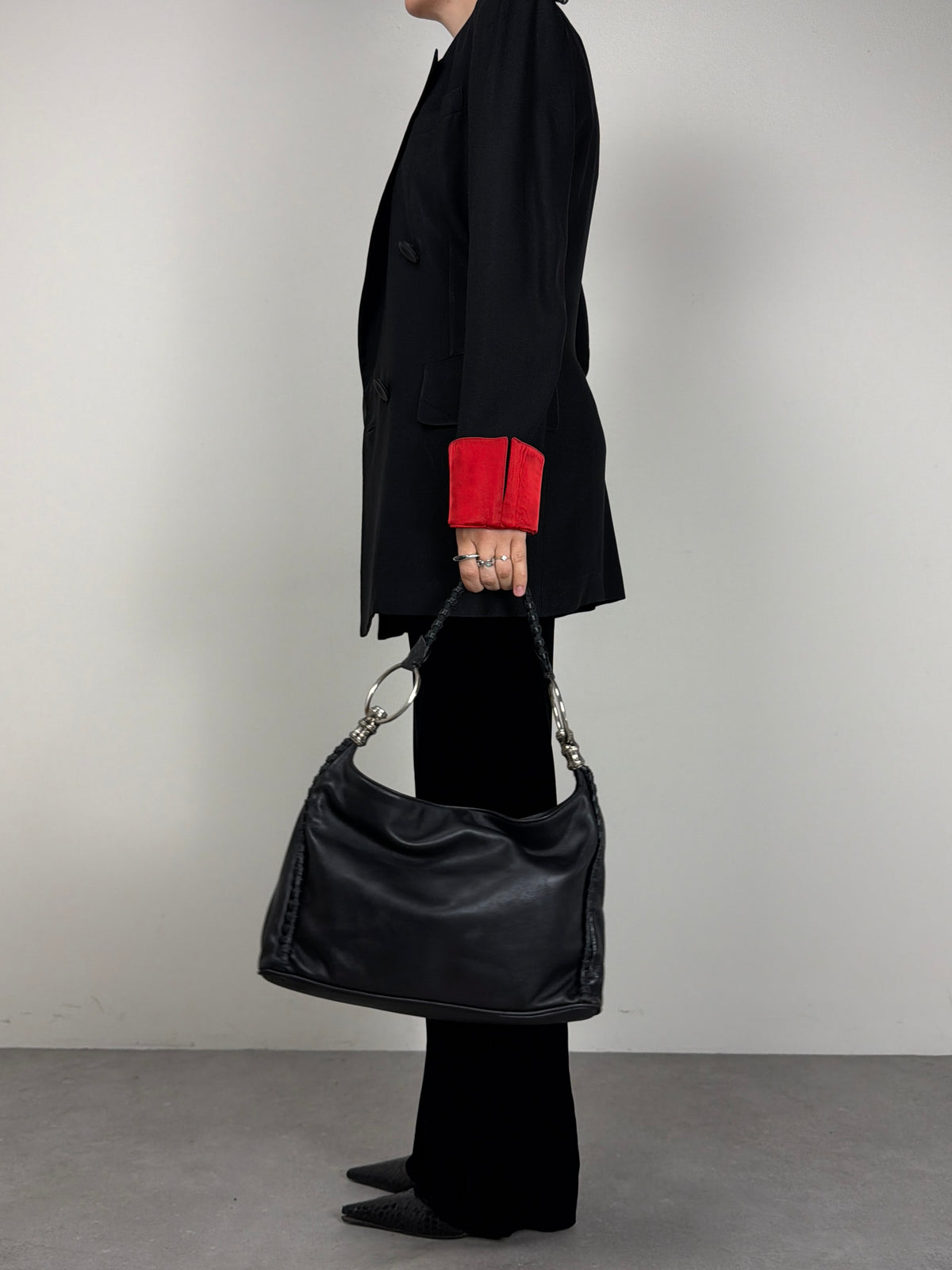 Borsa in vera palle con anelli metallici