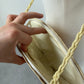 Borsa a conchiglia in paglia intrecciata